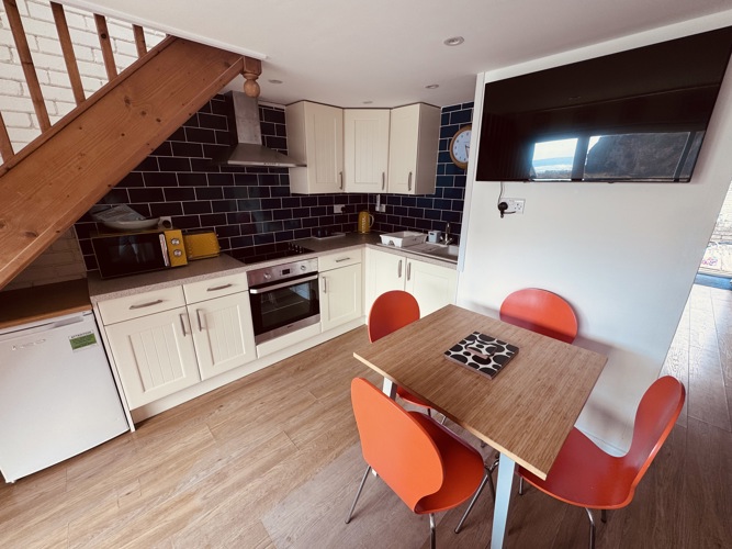 Kitchen dining area with smart TV