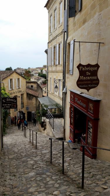 St Emilion St Emilion old cobbled steep street with small wine shops