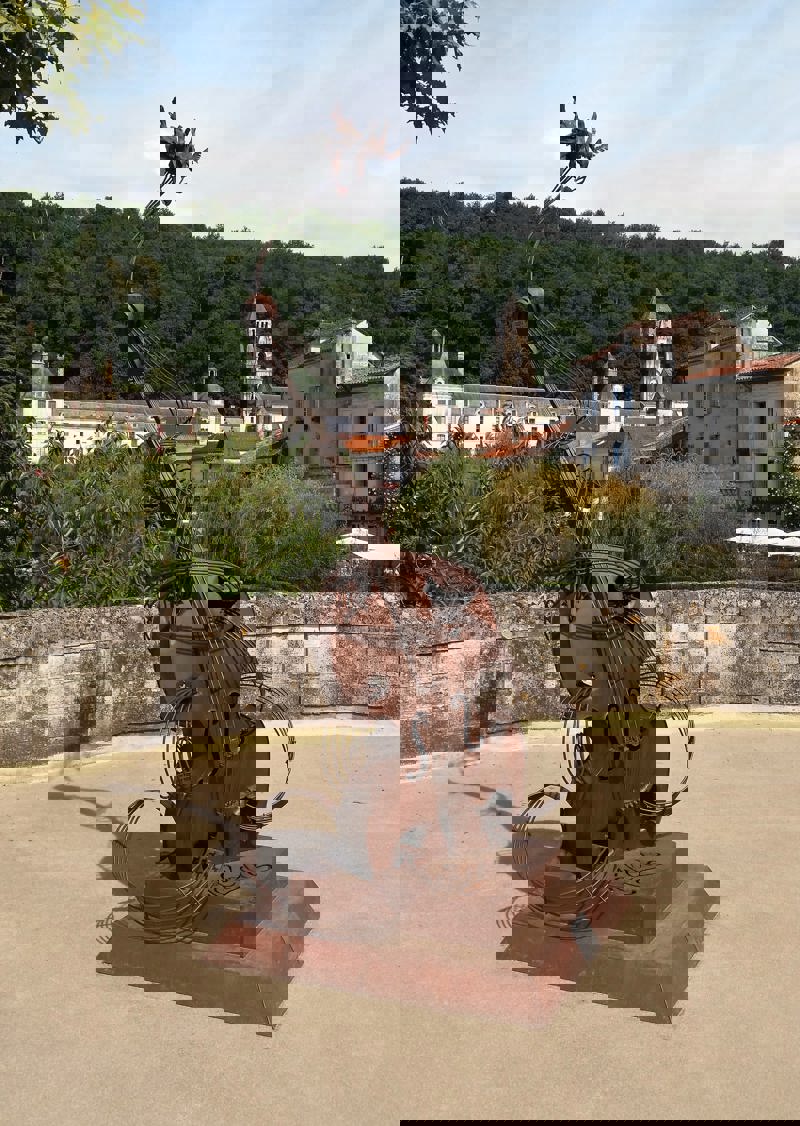 A metal guitar feature on the riverside in Brantôme, Périgord Vert, Dordogne