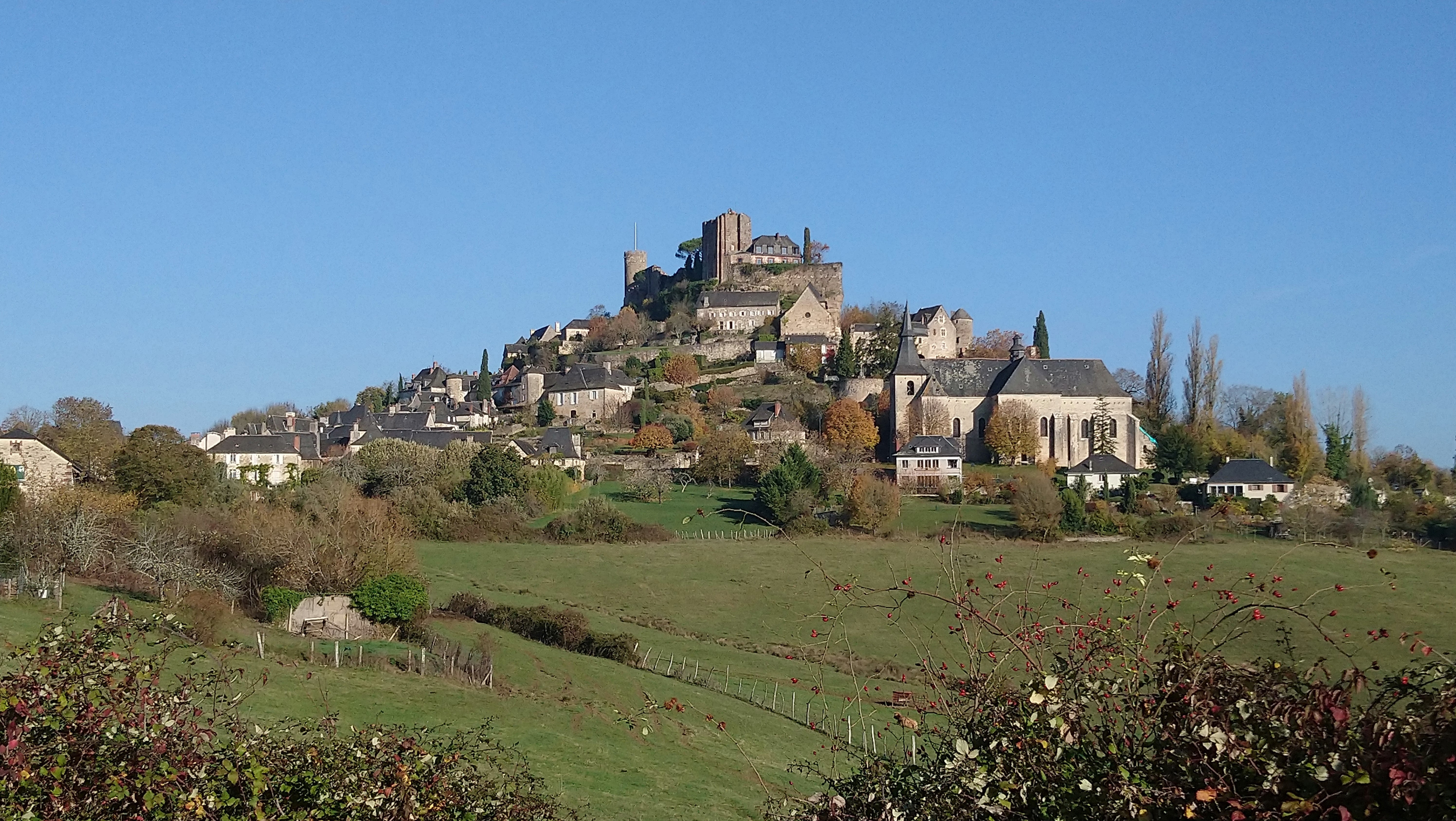 Turenne village Turenne village perched on hill with grass in front