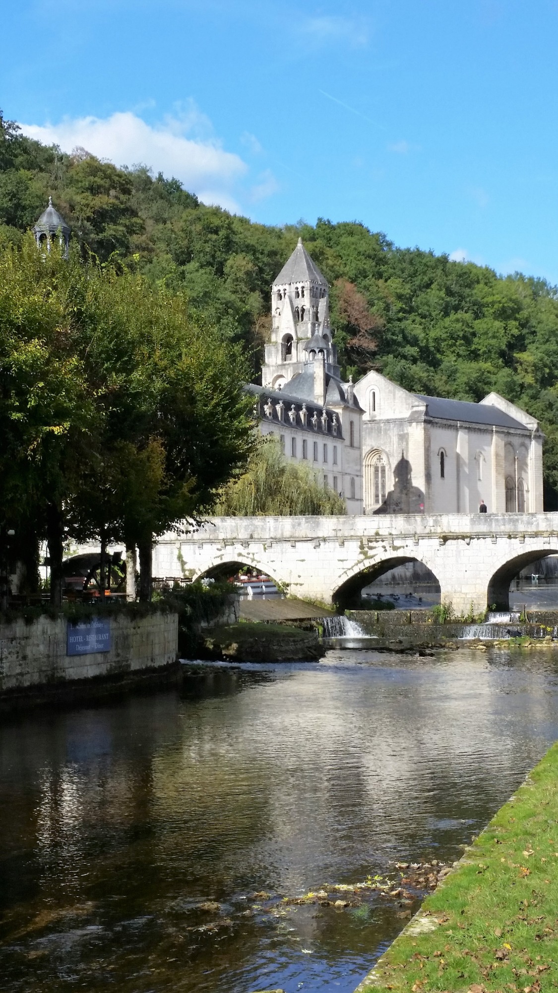 White Benedictine Abbey beside the river in Brantome