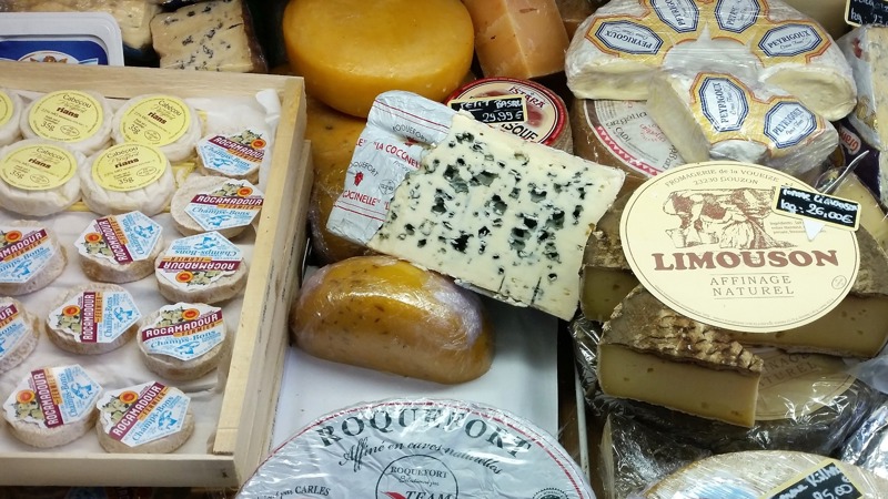 A selection of cheeses in a French market in the Limousin