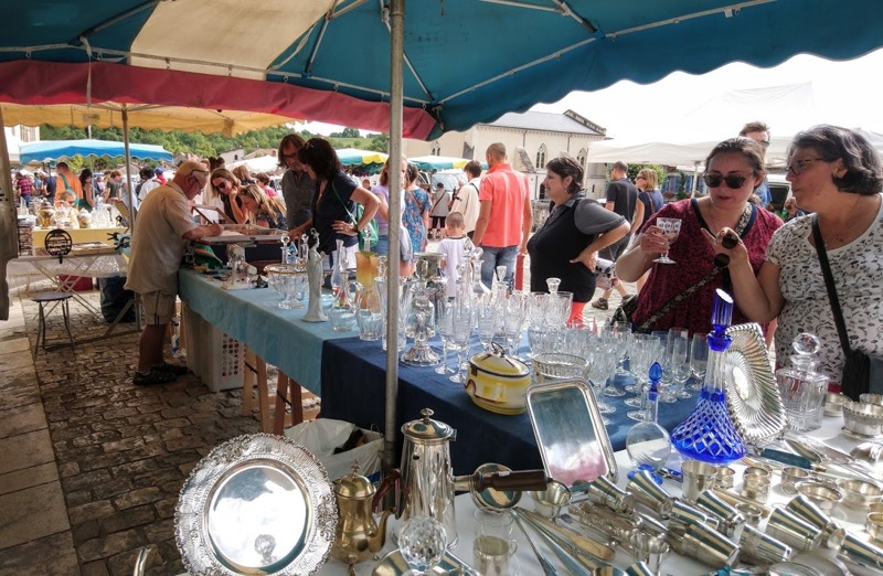 Summer brocante in the medieval town centre of Brantôme, Périgord Vert, Dordogne