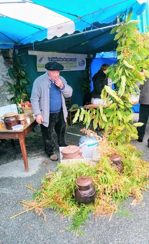 Farmer eating roasted chestnuts at the annual chestnut fete in Dournazach