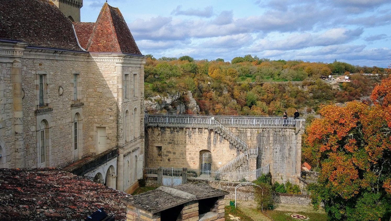 Rocamadour Rocamadour a church perched on a hill as seen through a arched bridge with ancient streets