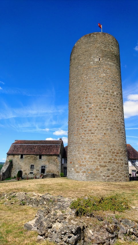Tower of Chateau Chalus Chabrol in slightly misty light during the Winter