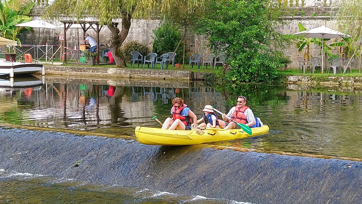 Canoeing in Brantome Family canoeing on the river in Brantome