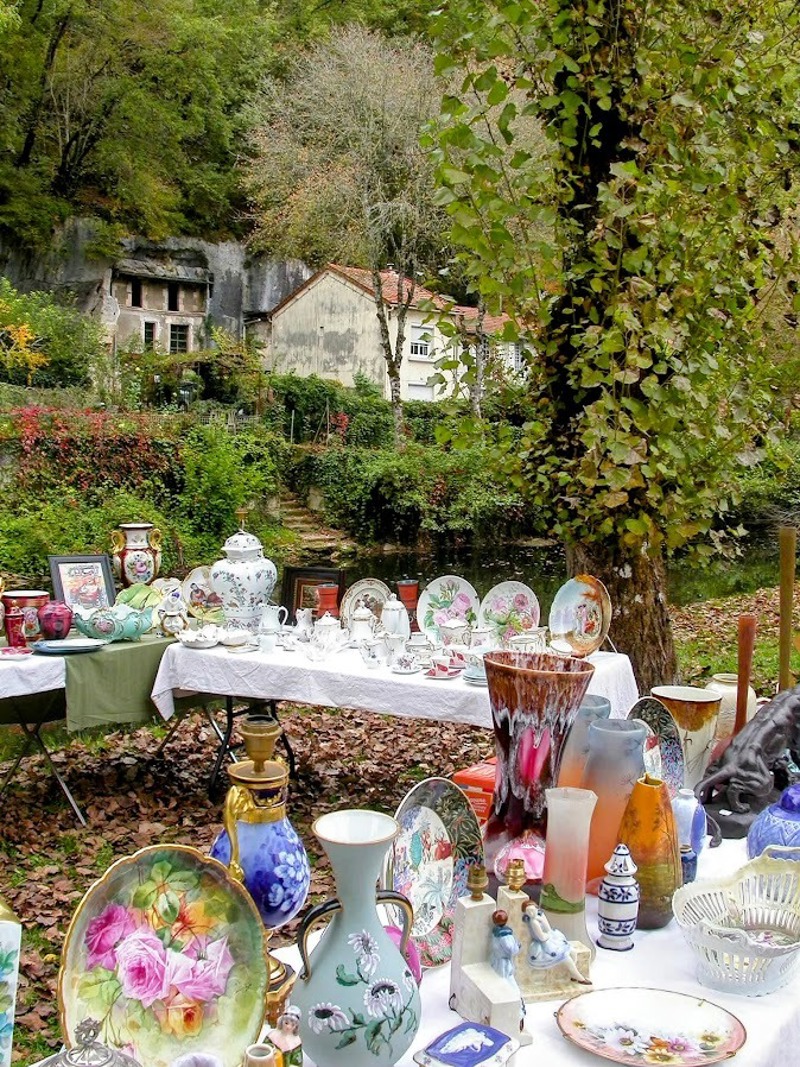 Vintage porcelain and ceramics on a vide-grenier stall in Brantome, Dordogne, France