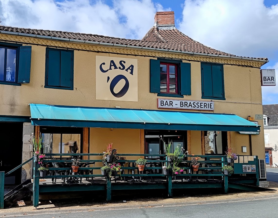  A charming 3 story ivy clad mill and restaurant nestled by a serene river, surrounded by lush trees. A perfect blend of tranquility and beauty