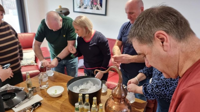 Bottles of Redcastle gin and rum on a table at Redcastle tasting experience