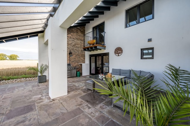 Patio with Dining and BBQ Patio with outdoor dining furniture and BBQ