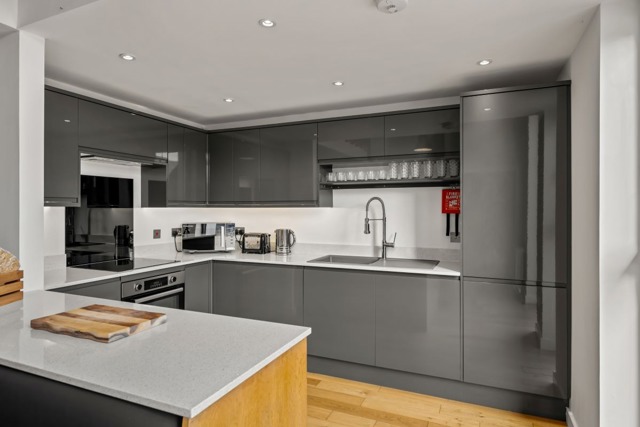 well equipped open plan kitchen with marble worktops well quipped open plan kitchen with marble worktops