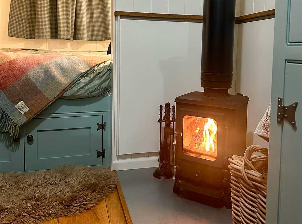 woodburning stove in shepherds hut