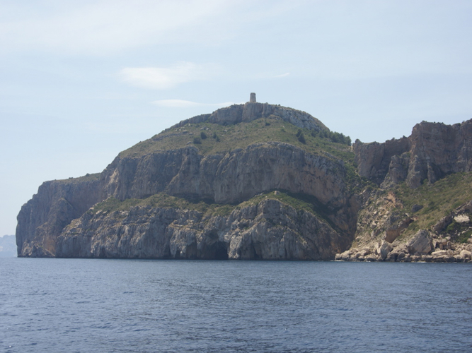 View from the sea back towards Cumbre del Sol and Moraira