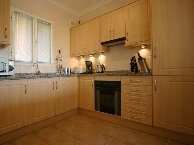 Fully equipped modern kitchen with dishwasher, oven, kettle, toaster, juicer, fridge freezer, microwave and every imaginable gadget