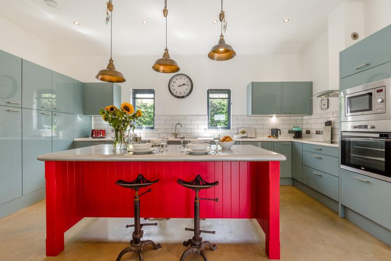 Bright contemporary well equipped kitchen and dining area in Sienna
