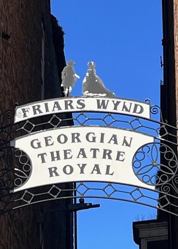 Image of Friars Wynd sign above the sign for Georgian Theatre Royal