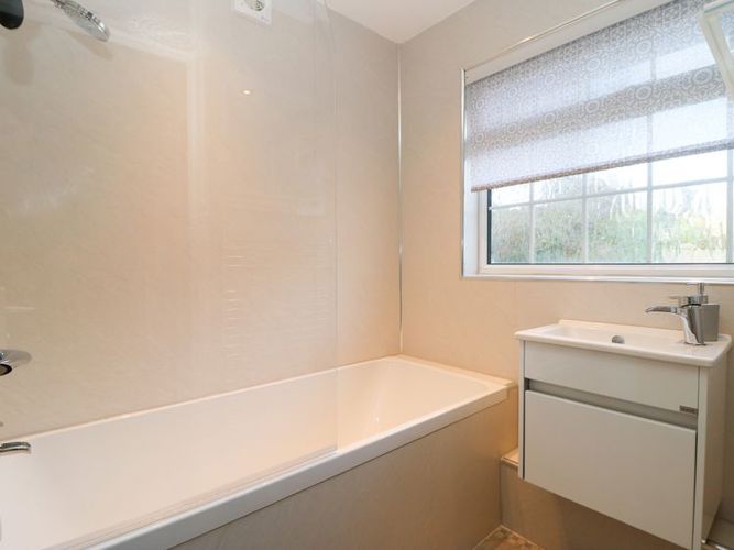 Image of bathroom and bath at Moulton View Holiday Cottage