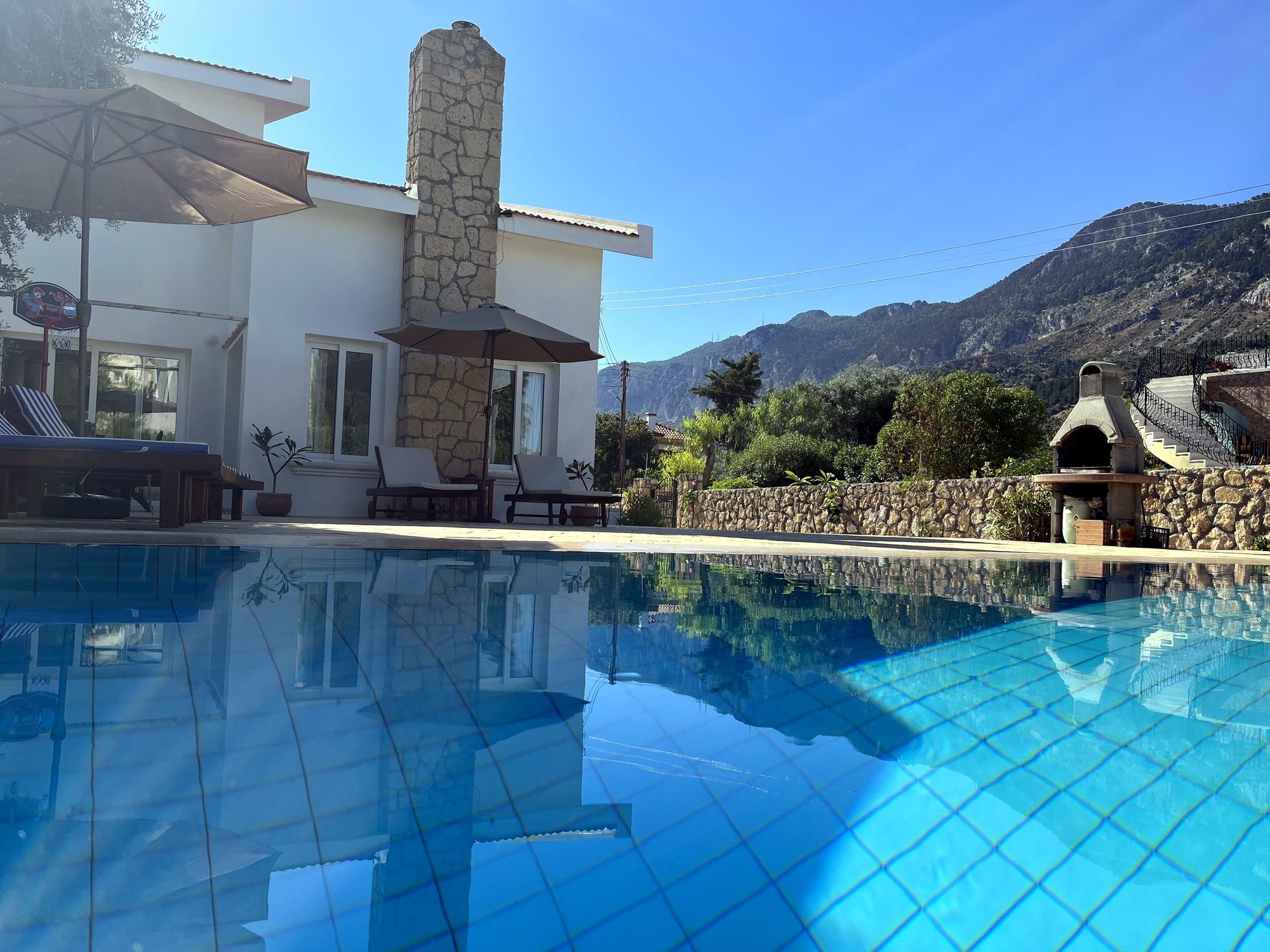 Villa Zeytin in Karsiyaka with private pool, terraces and mountain views Front view of Villa Zeytin, a three-bedroom private villa in Karsiyaka, North Cyprus