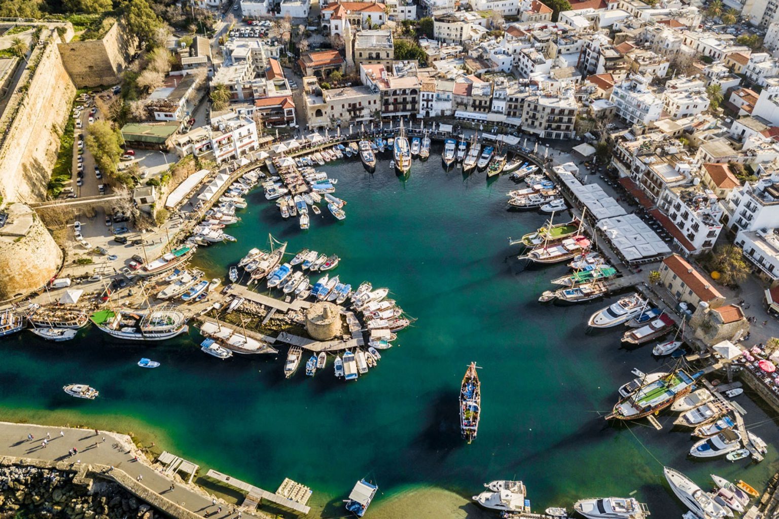Restaurants and traditional boats around Kyrenia Harbour in Northern Cyprus
