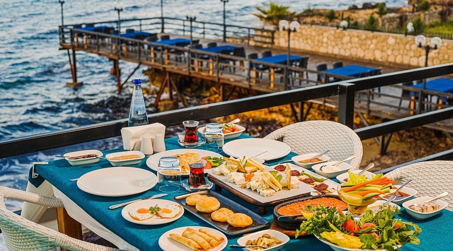 Local food, wine, meze and relaxed Mediterranean evenings. Local food, wine, meze and relaxed Mediterranean evenings.