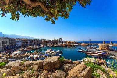 Kyrenia Harbour in North Cyprus with waterfront restaurants and historic castle views