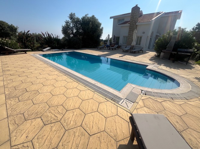 Poolside view towards Villa Zeytin and the Kyrenia mountains