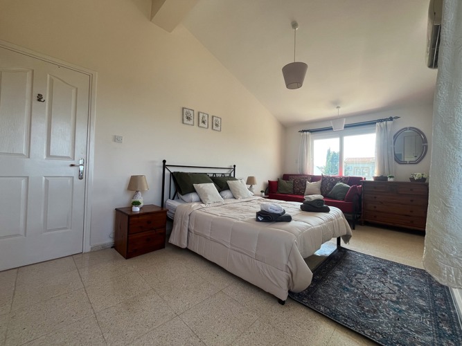 Master bedroom with garden view at Villa Zeytin