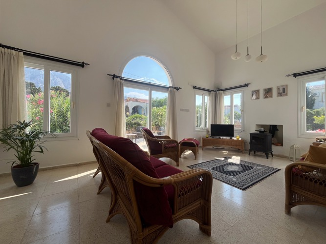 Sunlit Villa Zeytin living room with mountain views