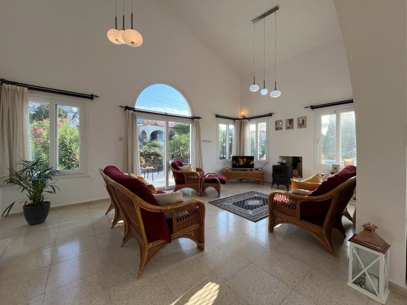 Villa Zeytin lounge with sofas and doors to the terrace