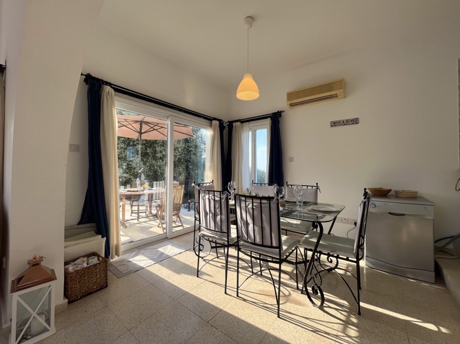 Open-plan dining area beside the terrace at Villa Zeytin
