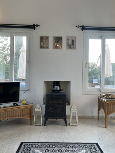 Comfortable lounge and fireplace at Villa Zeytin
