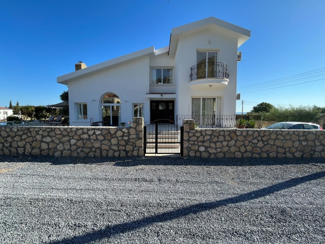 Villa Zeytin exterior and stone boundary wall in Karşıyaka