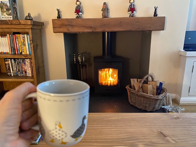 tea relax log burner cozy comfortable warm welcoming holiday cottage