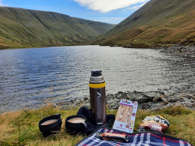 Picnic stop picnic lunch flask of tea lakeside view
