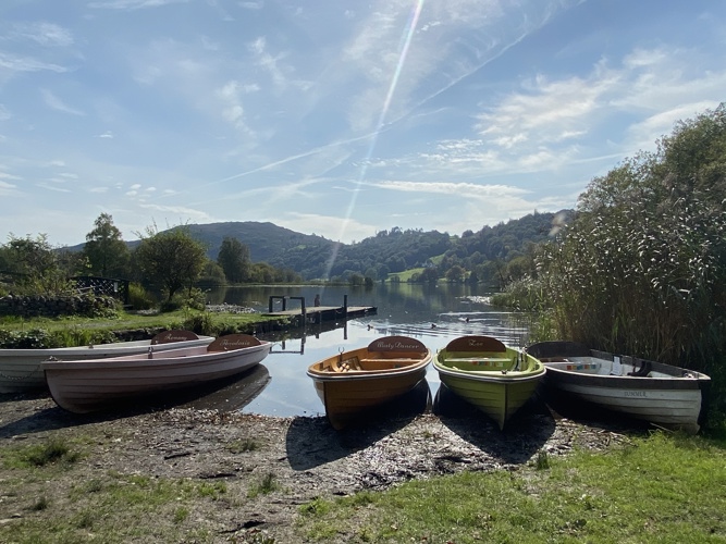 Grasmere Lake rowing boats mountains sunshine lake views