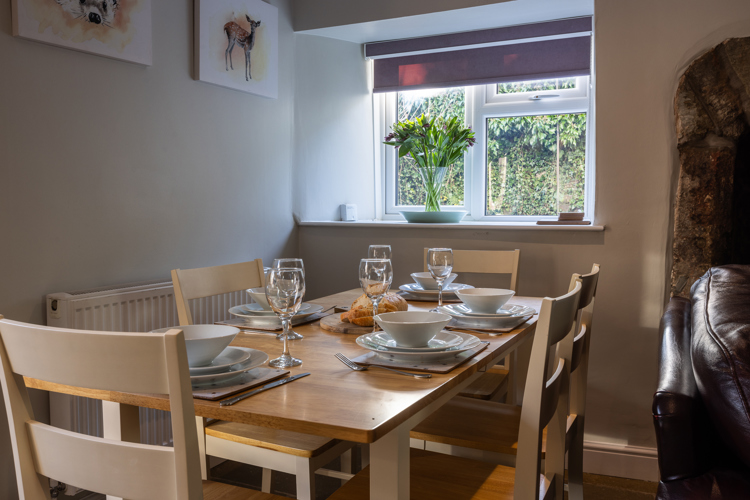 Dining table with seating for five people